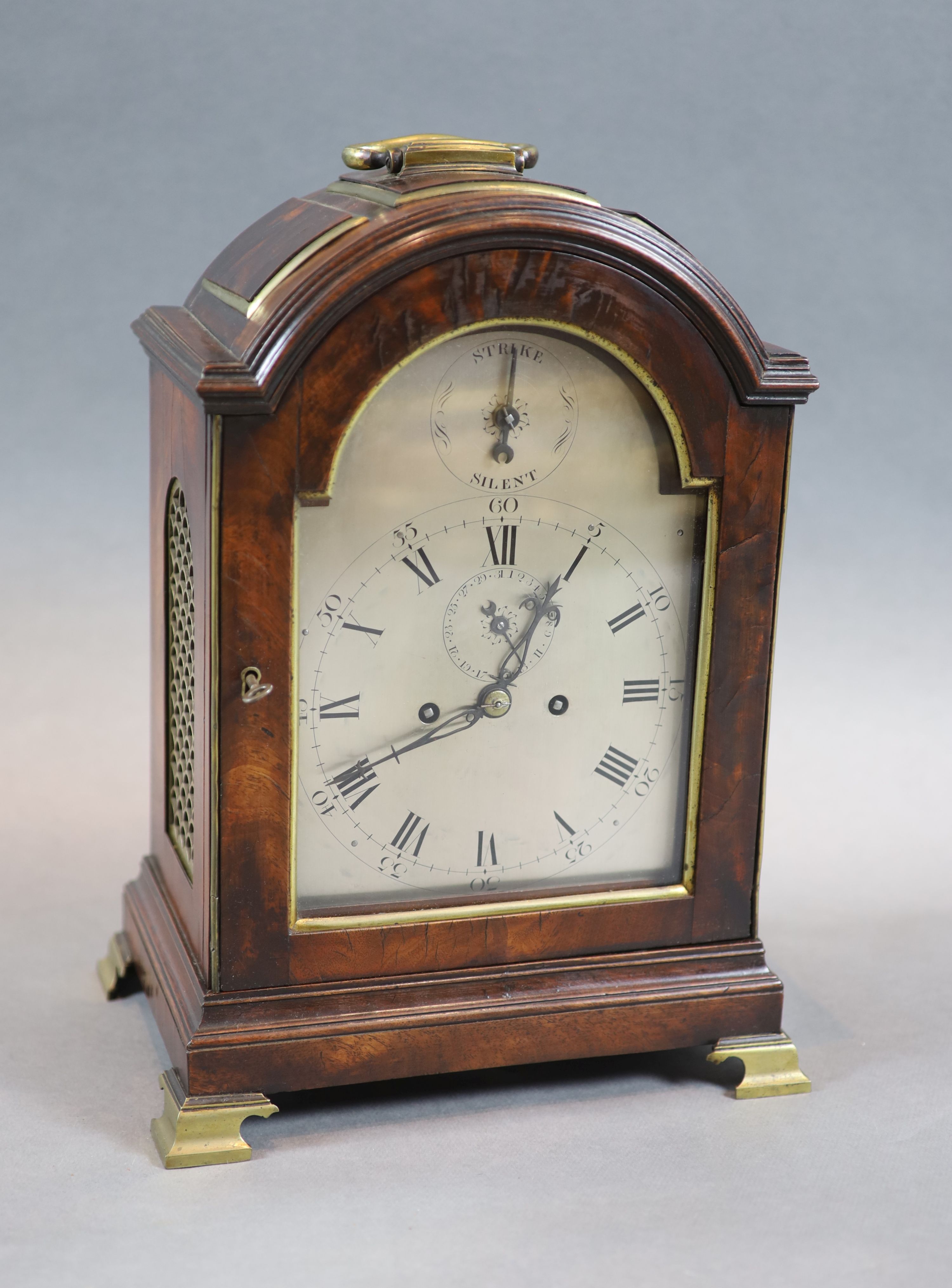 A George III eight day mahogany and brass mounted bracket clock, 39cm high.